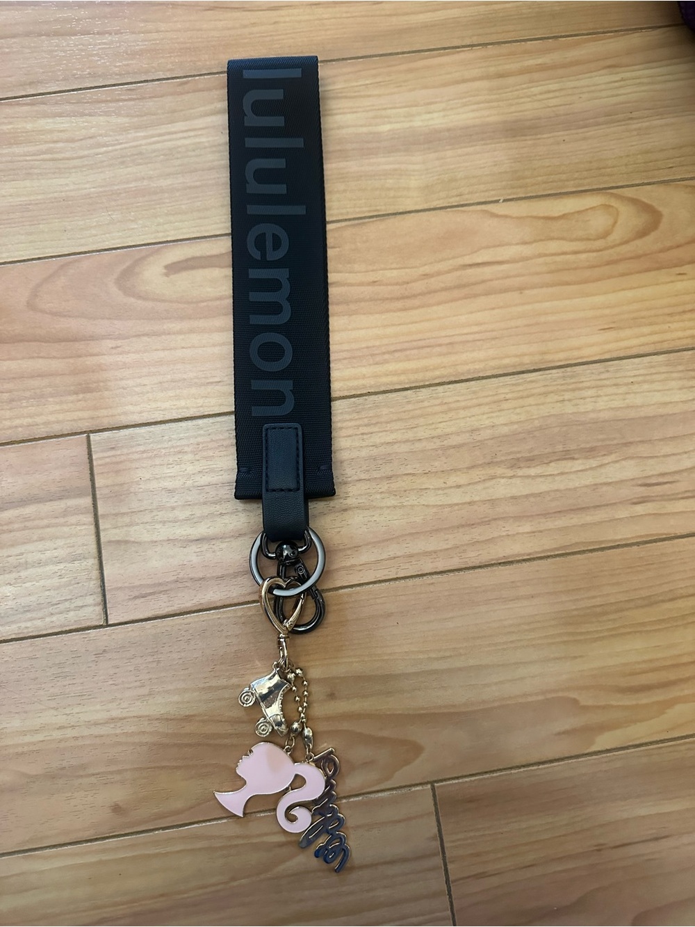 lululemon athletica Black Lanyard with Pink Charm and Gold Hardware